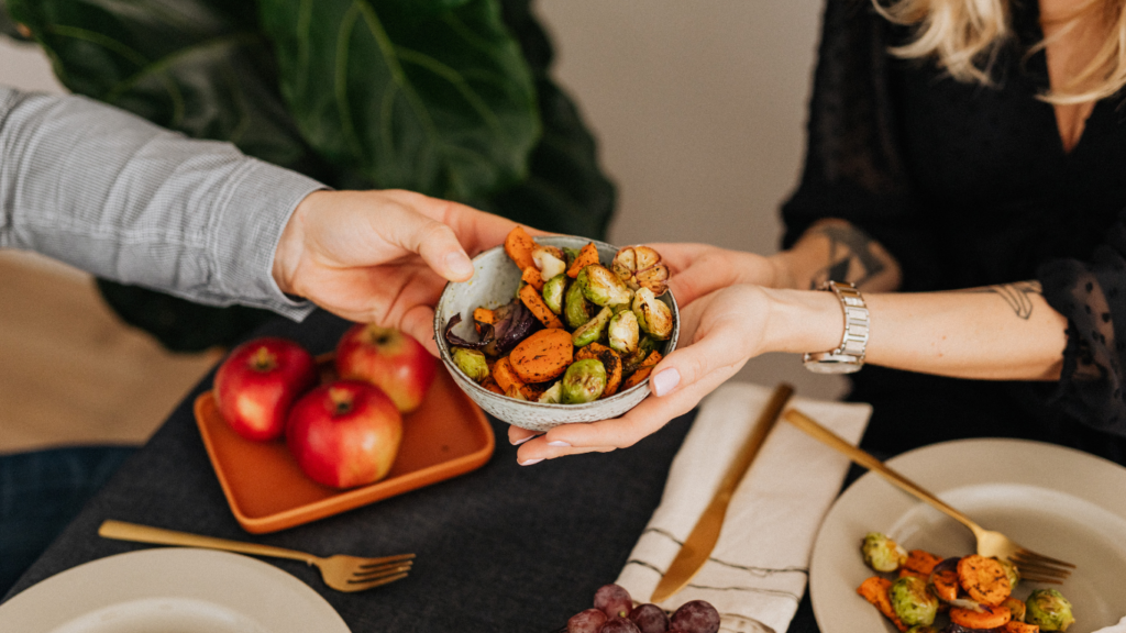 sharing food at the dining table